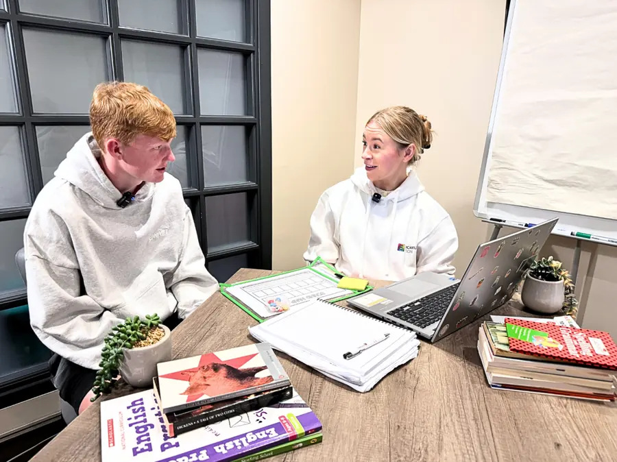 An Educamus Tuition tutor talking through a past paper question with a secondary school student